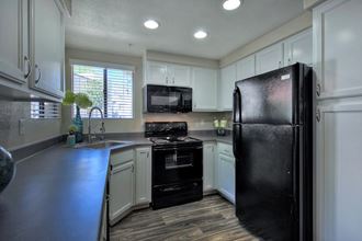 Granite Counter tops and High-end Cabinetry Granite Counter tops and High-end Cabinetry at Elevate at Discovery Park, 1820 East Bell De Mar Drive, AZ - Photo Gallery