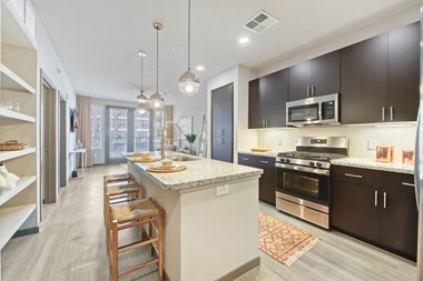 Kitchen island at Centra Midtown Apartments