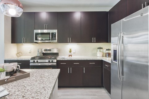 Dark kitchen scheme at Centra Midtown Apartments