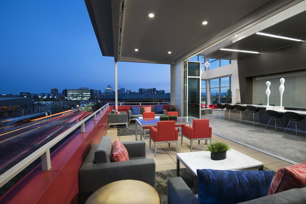 a lounge area on the top of a building