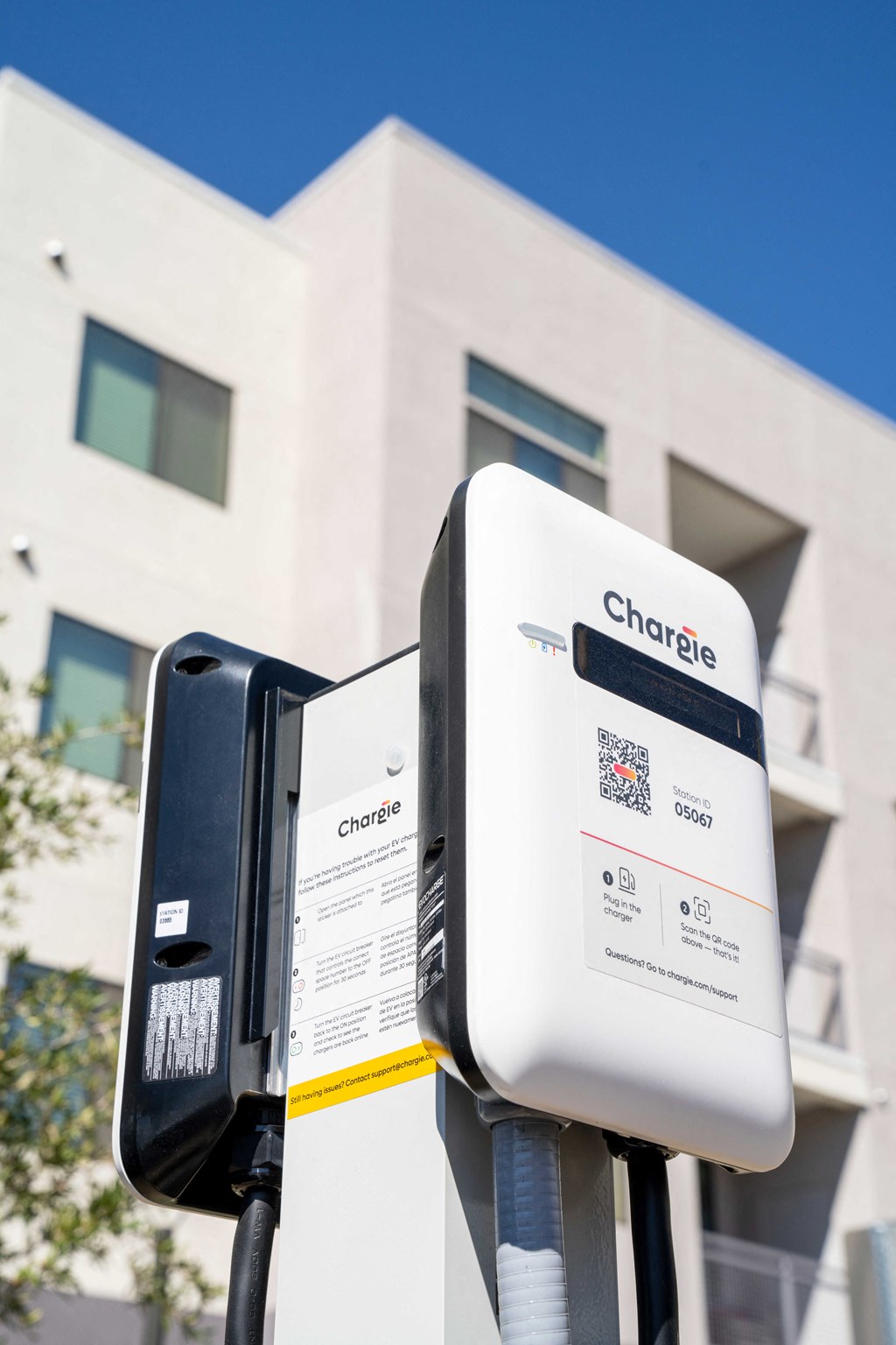 a charging station in front of a building