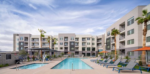 our apartments have a large swimming pool with lounge chairs