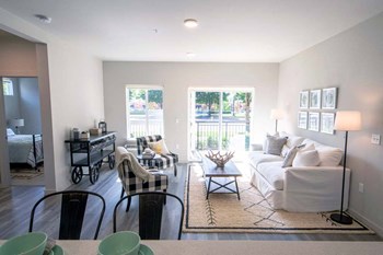 Spacious Living Room With Private Balcony Spacious Living Room With Private Balcony at Hearth Apartment Homes, Vancouver, Washington - Photo Gallery 3