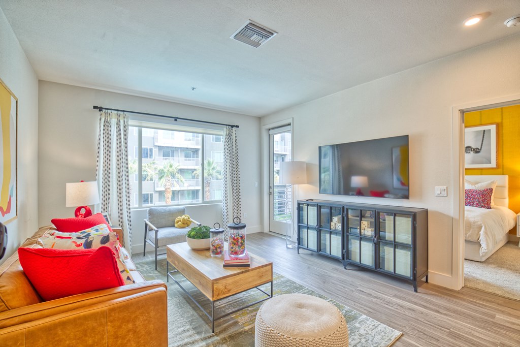 a living room with a couch and a tv