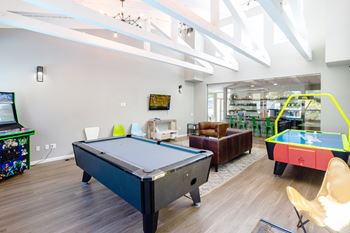 a game room with a billiards table