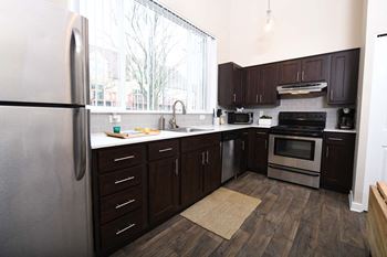 Modern Kitchen With Cabinet at Russellville Commons, Portland, OR