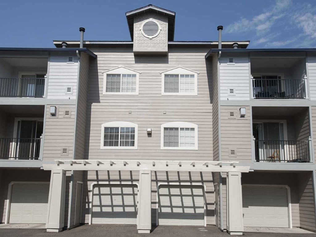 Fresh exterior with in-unit parking at Marina Village Apartments, Sparks NV