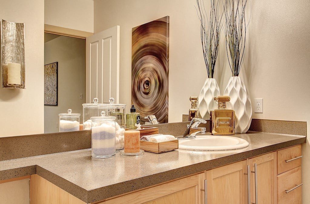 Designer Granite Countertops in all Bathrooms, at Newberry Square Apartments, 16116 Ash Way