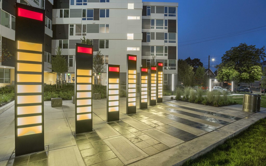 illuminated columns in front of Twenty20 Mad Apartments
