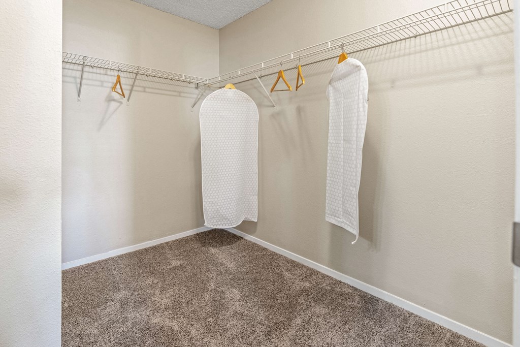 Walk in closet at Village at Desert Lakes
