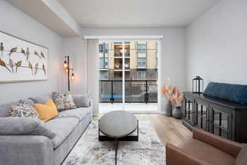 Living room at Village on Main Apartments - Photo Gallery 3