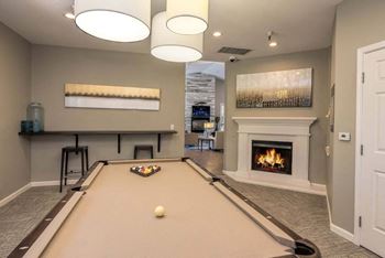 Billiards Table & Fireplace In Clubhouse at Atwood Apartments, California, 95610