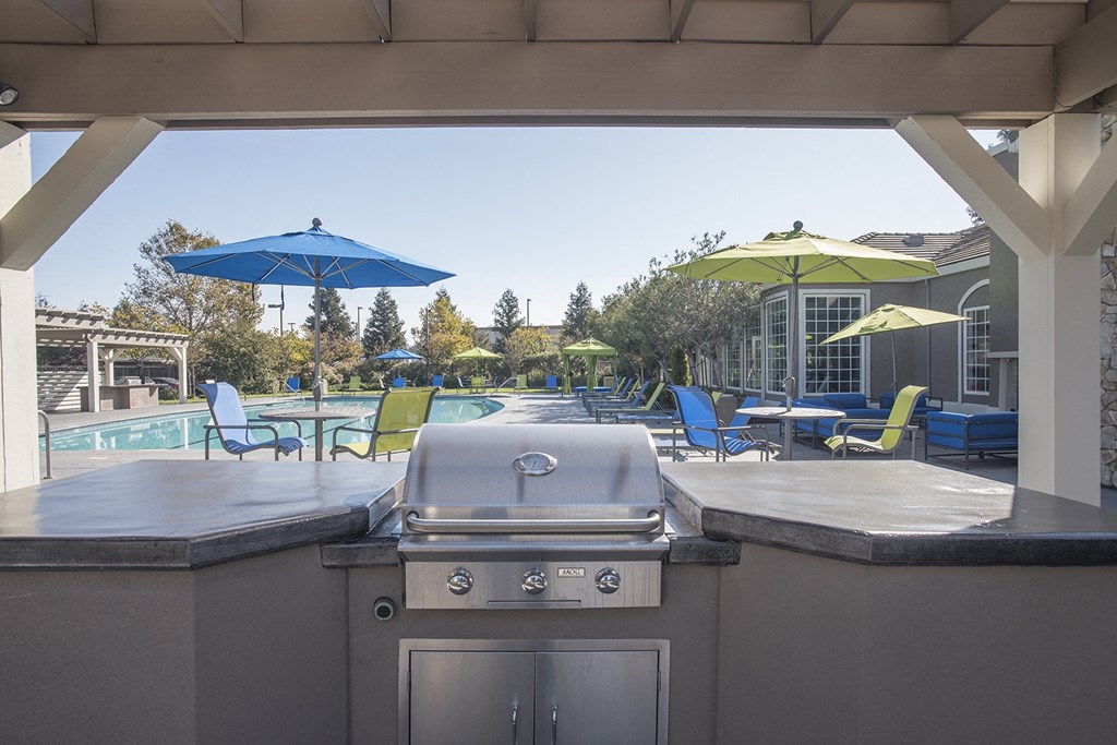 grill area by pool deck at North Pointe Apartments, CA 95688