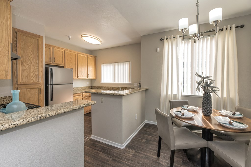Dining Room and Kitchen View at Atwood Apartments, California, 95610