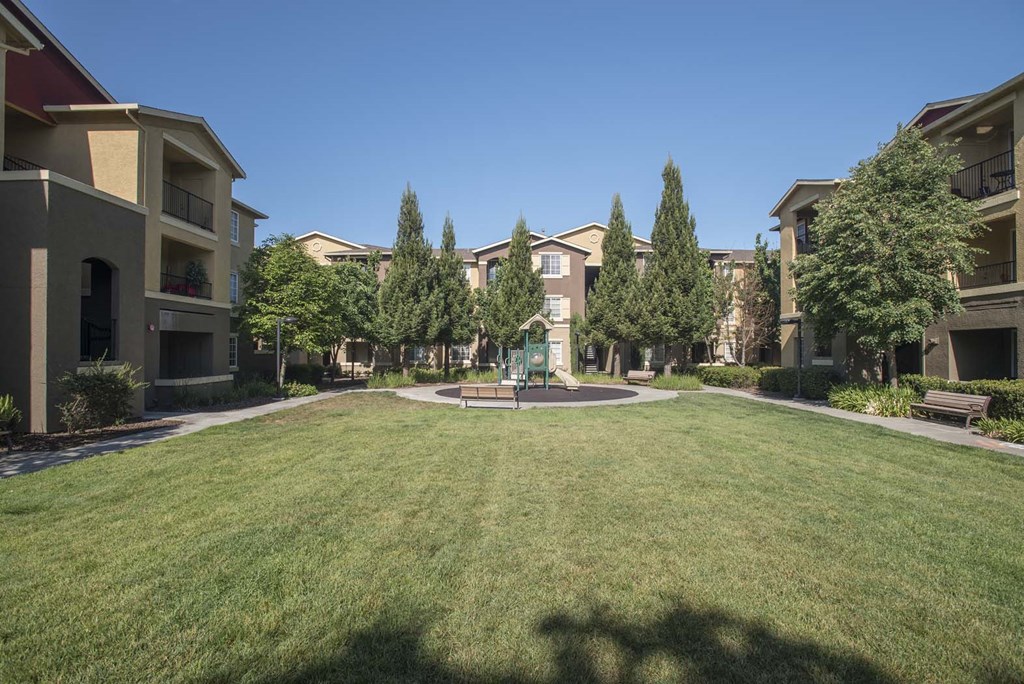 Tot Lot And Playing Field at Sterling Village Apartment Homes, California, 94590