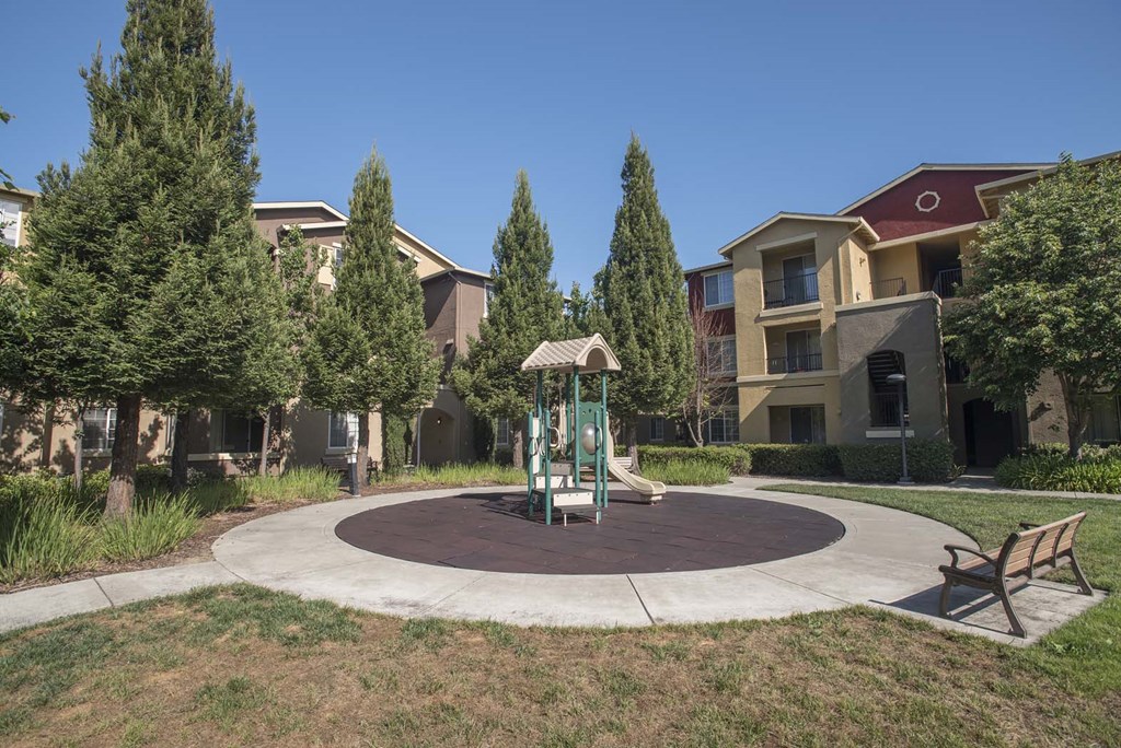 Tot Lot And Playing Field at Sterling Village Apartment Homes, California