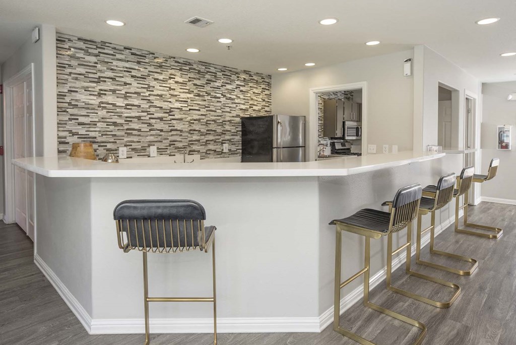 European-Style Kitchen With Breakfast Bar at Bella Vista Apartments