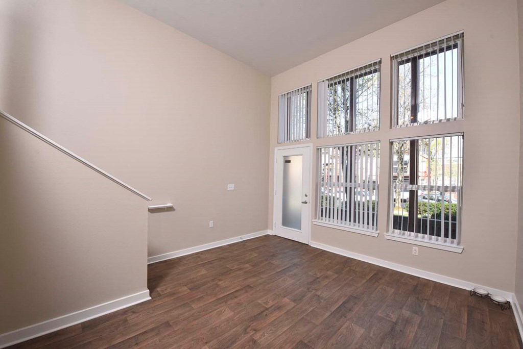 Living Room With Expansive Window at Russellville Commons, Oregon