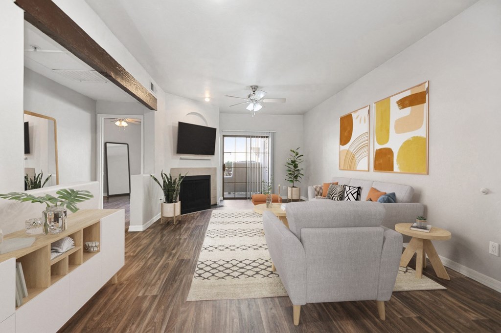 a living room with a couch and a tv