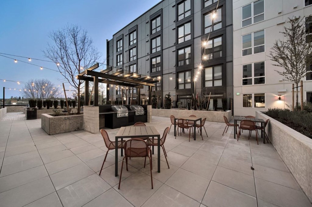 Courtyard with seating and BBQ