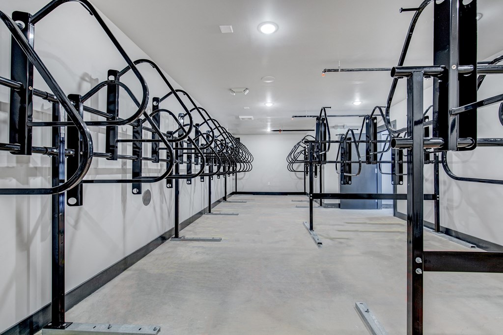a row of exercise machines in a room