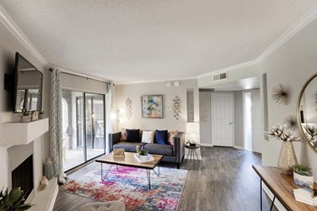 Living Room With Oversized Windows And Doors Living Room With Oversized Windows And Doors at Country Brook Apartments, Arizona - Photo Gallery 3