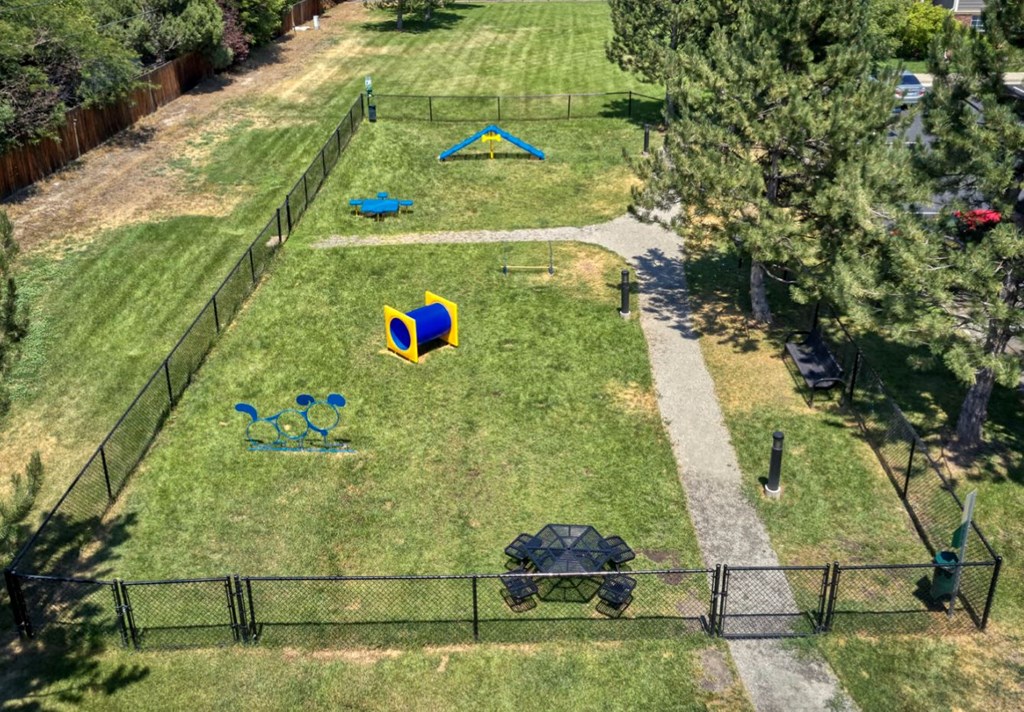 an aerial view of a park with playground equipment