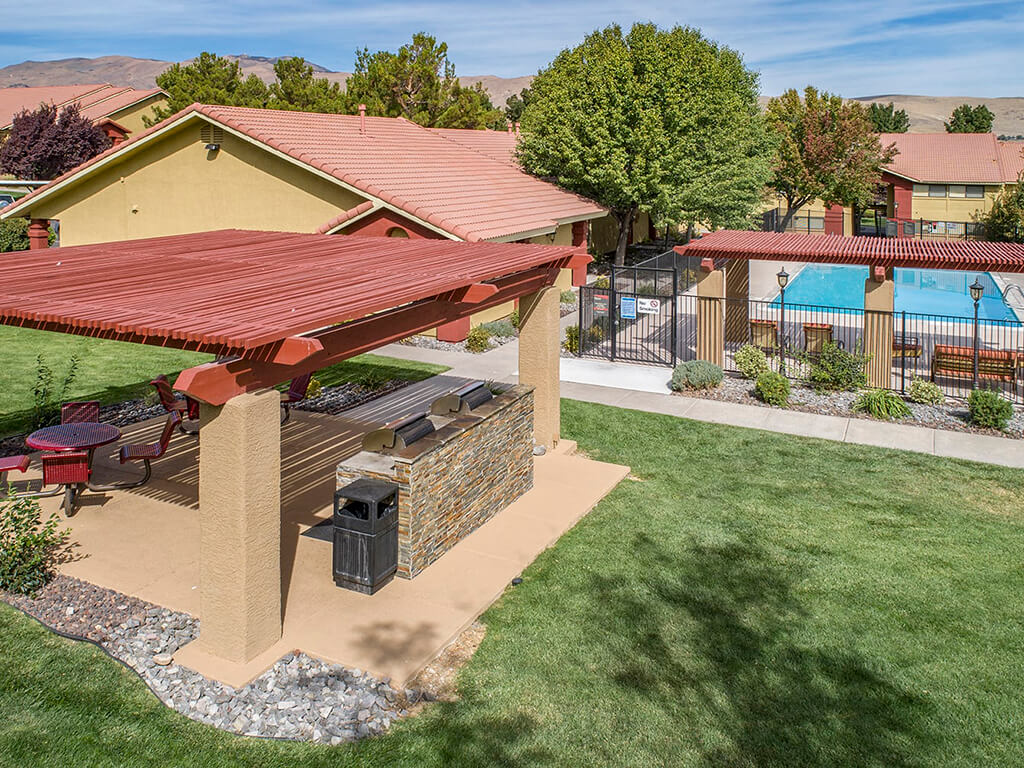 Shaded Patio With BBQ at Vizcaya Hilltop Apartments, Nevada
