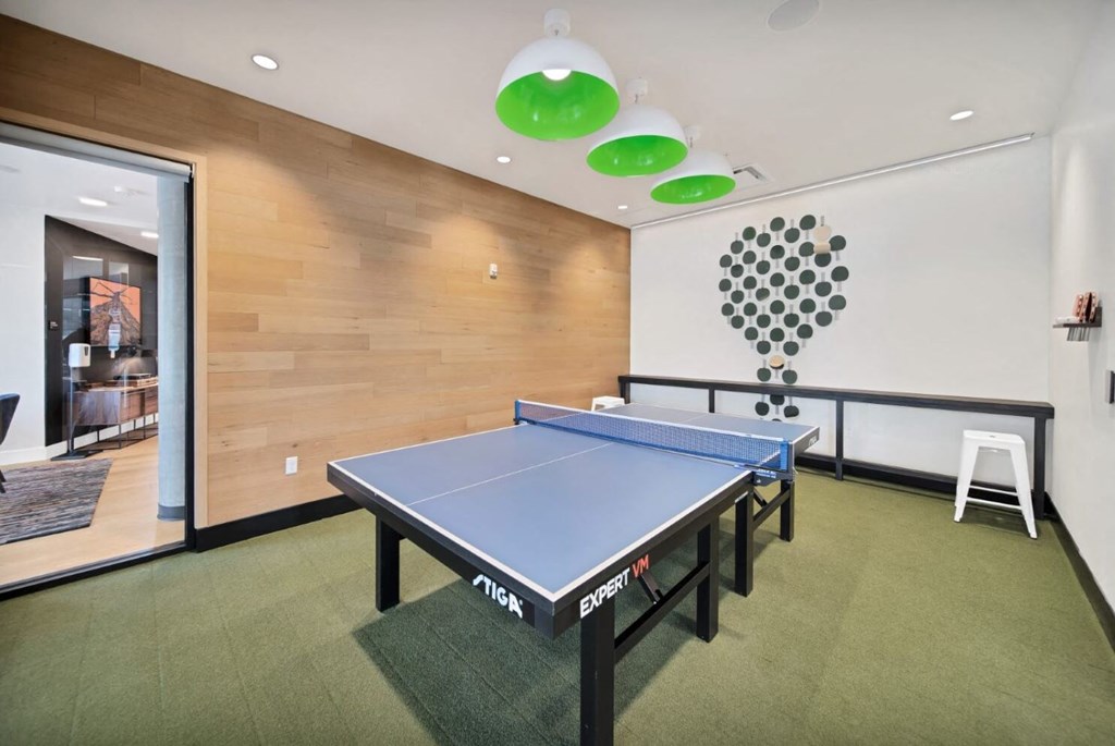 a ping pong table in the center of a room