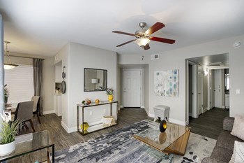 Living Room with Carpeted Flooring Living Room with Carpeted Flooring at Sonoran Apartment Homes, Phoenix - Photo Gallery 4
