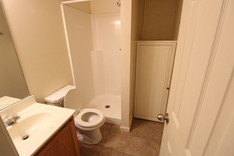 a bathroom with a toilet and a sink