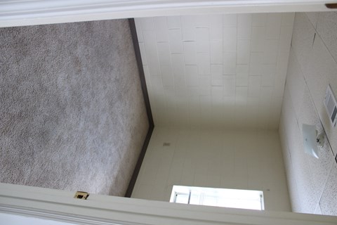 the view of the bathroom from the top of the closet
