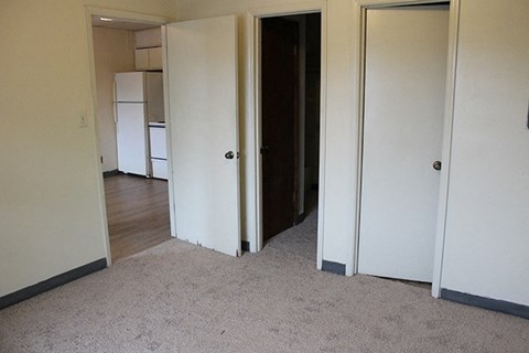 a view of the living room and kitchen from the dining room