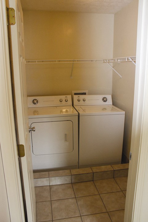 a washer and dryer in the laundry room