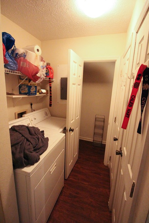 a small laundry room with a washer and dryer