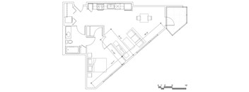 A floor plan of a house with a kitchen, living room, and bathrooms.