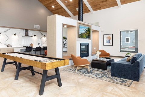 a pool table in the living room of a modern home