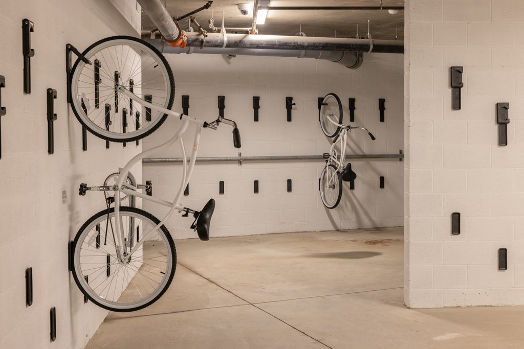 a bike hanging on a wall in a garage