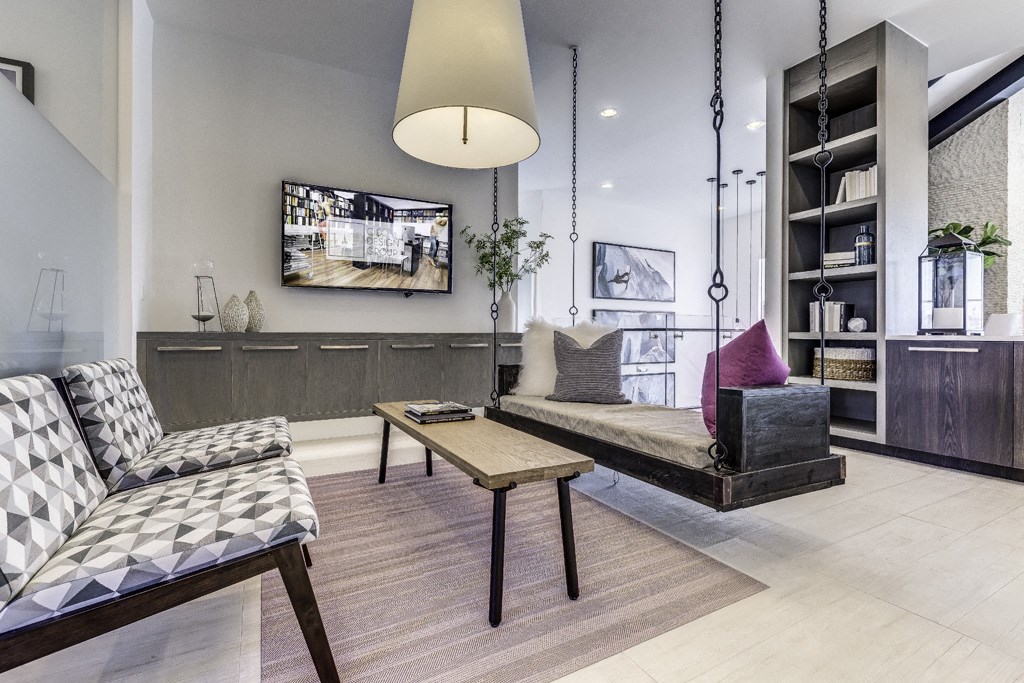 a living room with a couch and a table