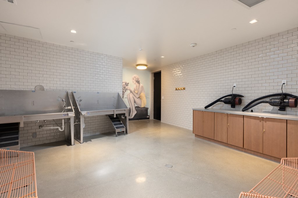 a large kitchen with a large sink and a bath tub