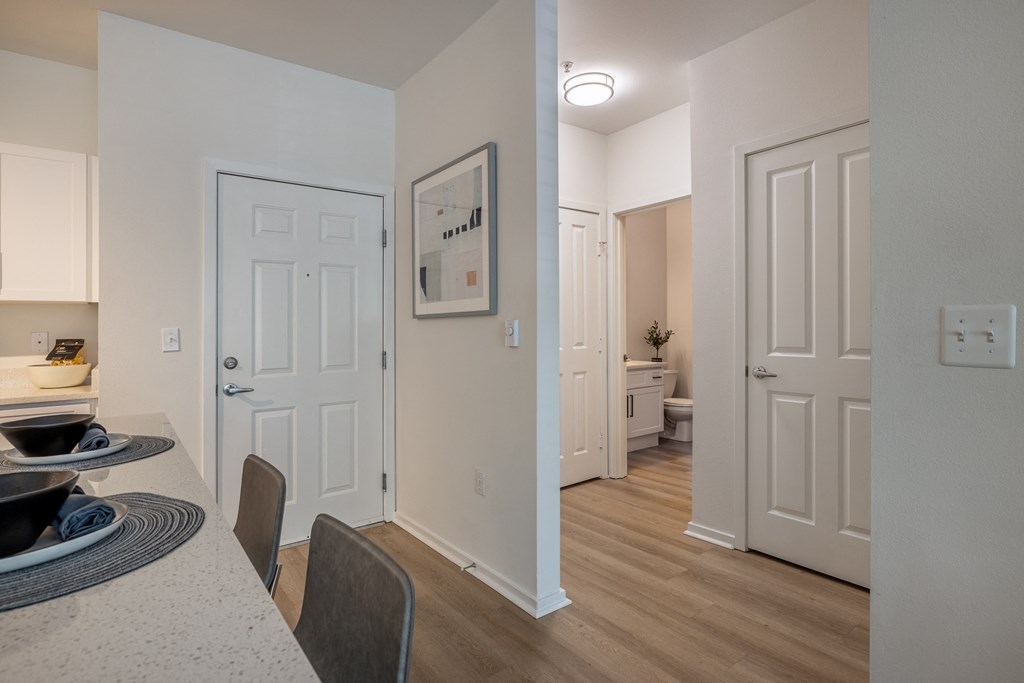a view of the kitchen and living room in a bedroom plus den unit at the whispering winds