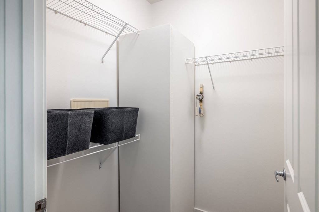 a walk in closet in a 555 waverly unit