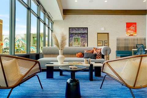 a living room with a couch and a table