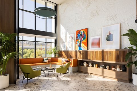 a rendering of a living room with orange couches and green chairs