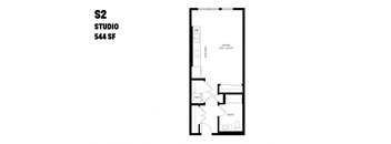 A floor plan of a studio apartment with a living area, kitchen, and bathroom.