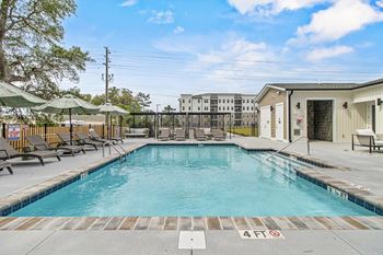 A pool with a 4 feet no dive sign.