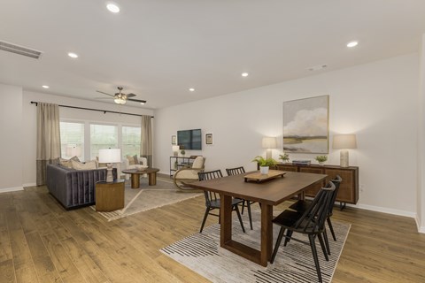 Open concept living and dining area at The Courts at Maverick Yards Apartments, Mauldin, SC