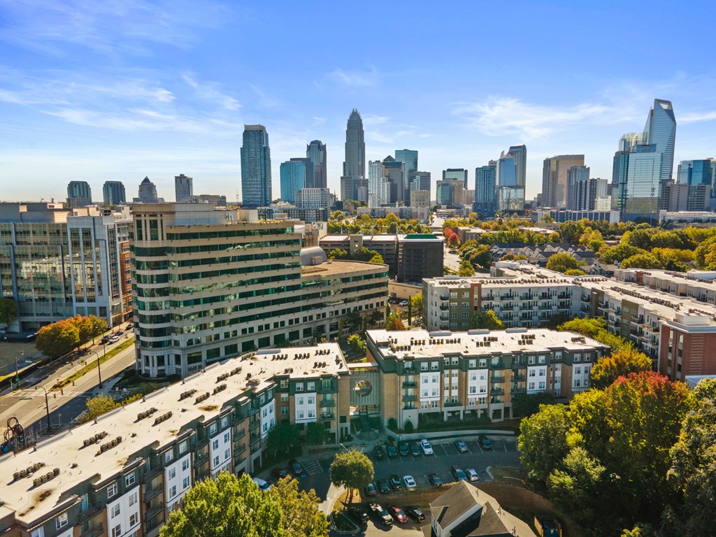 Flatiron West Trade Apartments aerial view with Charlotte skyline in background