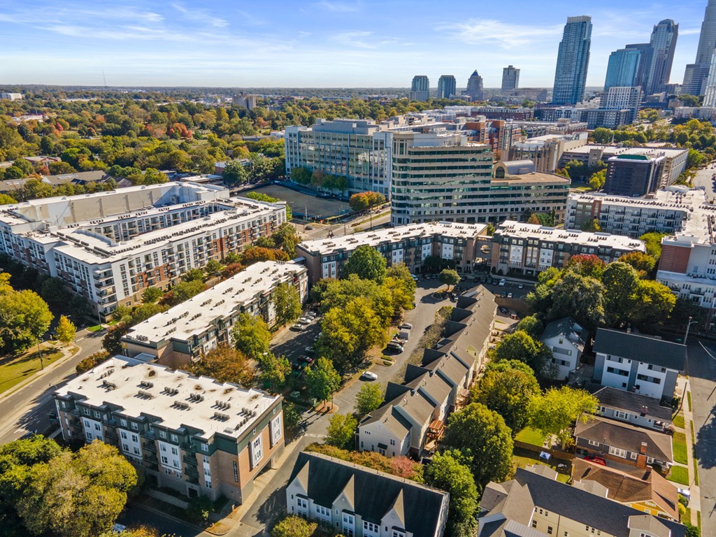 Flatiron West Trade Apartments aerial view with Charlotte skyline in background