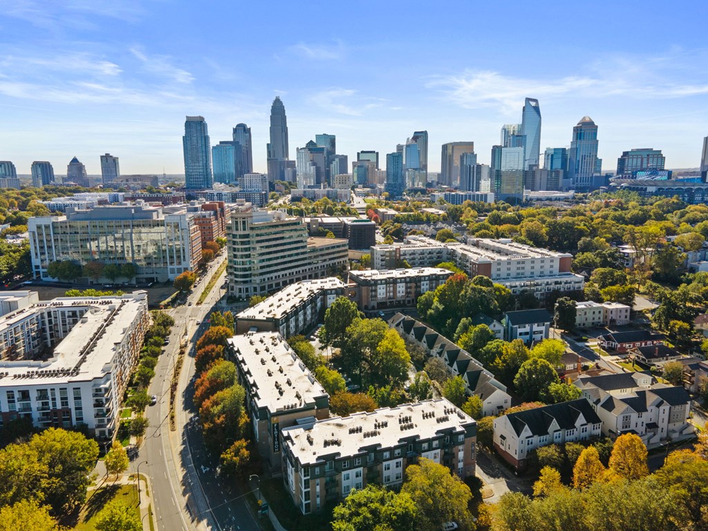 Flatiron West Trade Apartments aerial view with Charlotte skyline in background